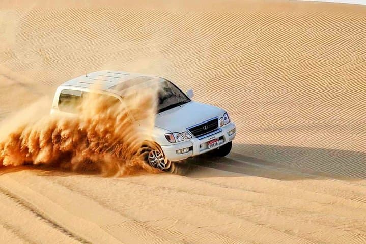 Evening Desert Safari in Dubai: Dune Bashing, Camel Ride & Seven Live Shows photo 4
