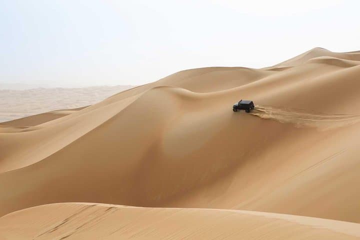 Dubai Desert Safari: Dune Bashing, Camel Ride & Sunset BBQ Experience photo 3