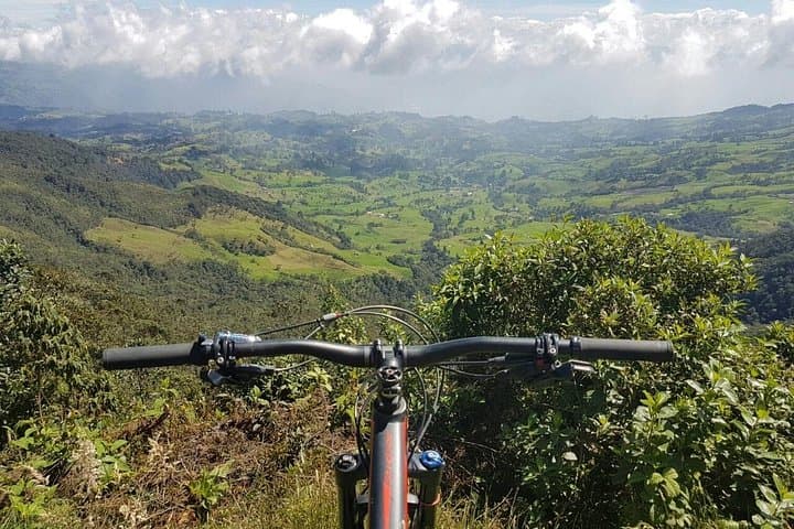 Cycling Through History: Medellín Mountain Bike Adventure on Old Railroads and Tunnels photo 1