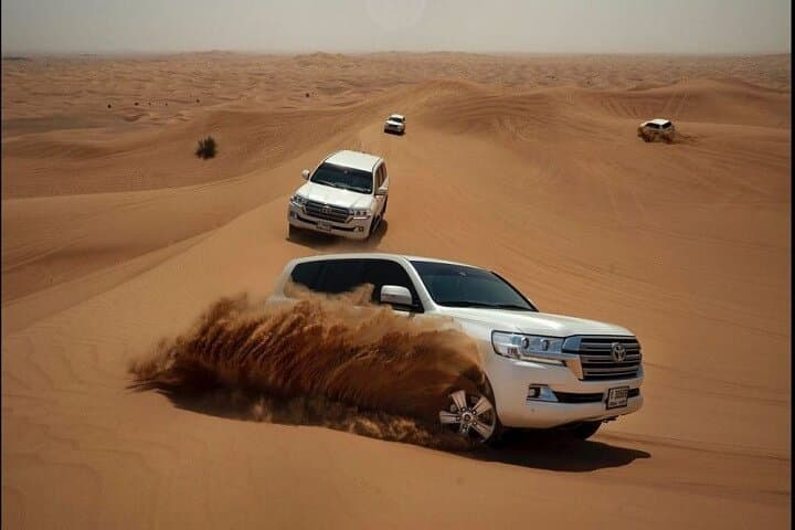 Dubai Desert Safari: Dune Bashing, BBQ Dinner & Live Shows