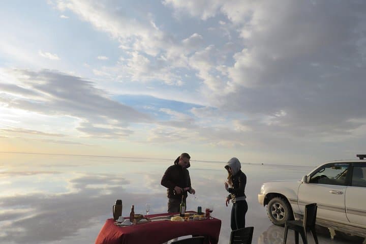 Overnight Bus to Salar de Uyuni from La Paz: Incahuasi, Train Cemetery & Sunset Reflections photo 3