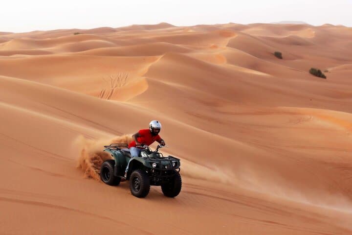 Morning Abu Dhabi Desert Safari: 4-Hour Dune Bashing, Camel Ride & Sandboarding