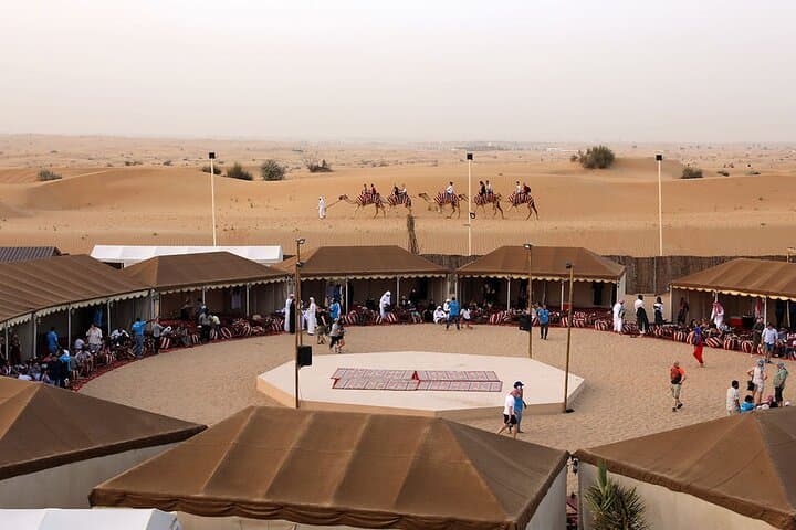 Morning Abu Dhabi Desert Safari: 4-Hour Dune Bashing, Camel Ride & Sandboarding photo 2