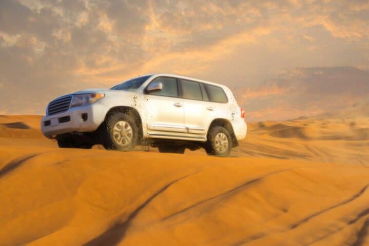 Dubai Desert Safari: Dune Bashing, Camel Ride & Sunset BBQ Experience photo 4