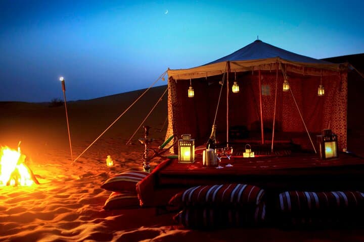 Sunset Dune Rush: Evening Desert Safari with Dune Bashing, Sandboarding & Camel Ride in Dubai photo 2