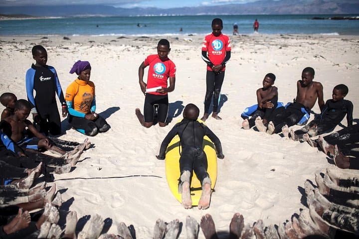 Cape Town Surf Lesson with NGO Kids: Learn to Surf and Support Local Changemakers photo 2