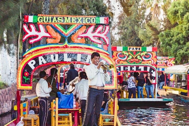 Private Xochimilco & Frida Kahlo Museum Tour — UNAM, Trajinera Ride & Coyoacán Day Trip photo 2