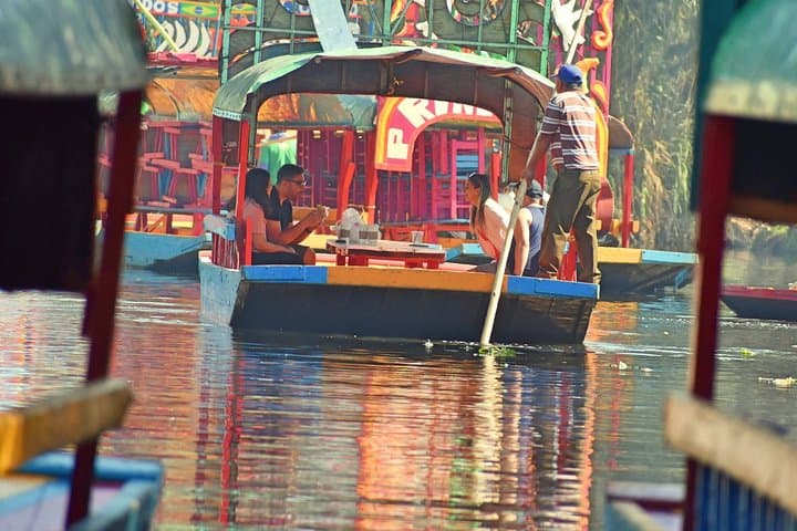 Private Xochimilco & Frida Kahlo Museum Tour — UNAM, Trajinera Ride & Coyoacán Day Trip photo 5