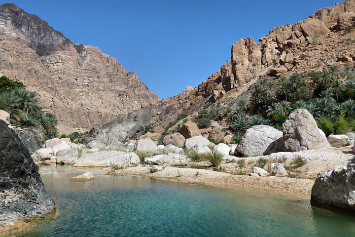 Swim Oman’s Wadis: A Day Trip from Muscat to Wadi Shab, Tiwi, and Bimmah Sinkhole
