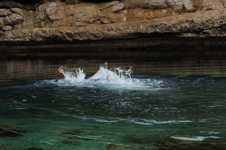 Swim Oman’s Wadis: A Day Trip from Muscat to Wadi Shab, Tiwi, and Bimmah Sinkhole photo 3