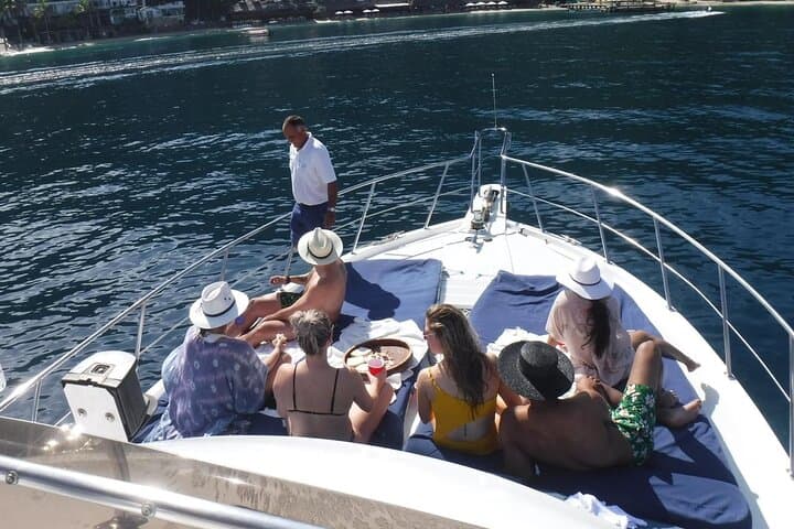 Puerto Vallarta Private 4-Hour 57' Bertram Yacht Charter — Bay Beaches & Snorkel Stops photo 3