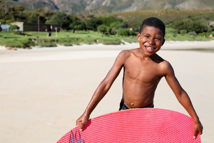 Skimboarding with a Youth Club Founder in Cape Town: Community Beach Experience photo 3