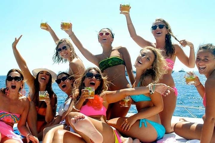 Sunset Party Catamaran to Isla Mujeres — Snorkel, Beach Club & Open Bar photo 3