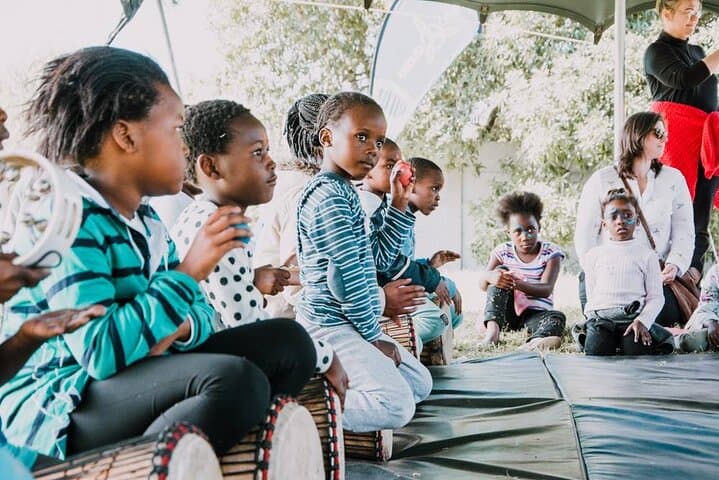 Cape Town Music Lesson with NGO Kids: Ukulele & Djembe Workshop photo 3