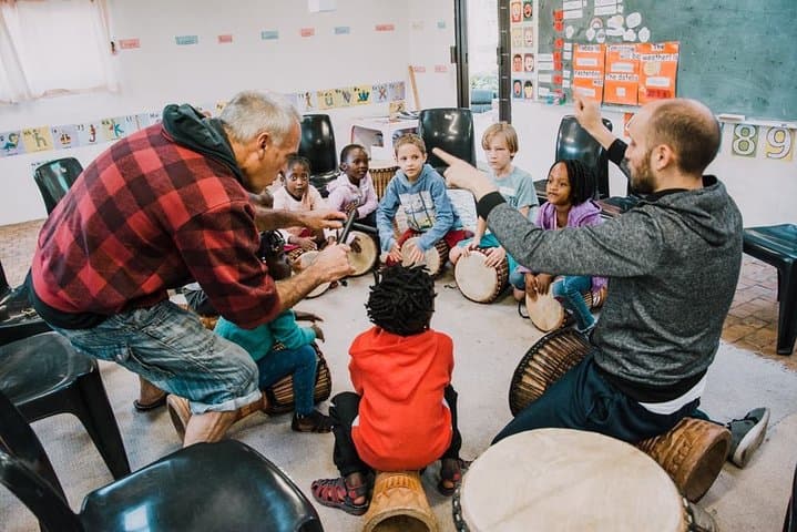 Cape Town Music Lesson with NGO Kids: Ukulele & Djembe Workshop photo 5