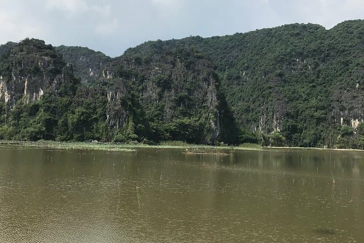 Hoa Lu & Tam Coc Day Trip: Sampan Boat Ride and Bicycle Through Ninh Binh Rice Fields photo 6