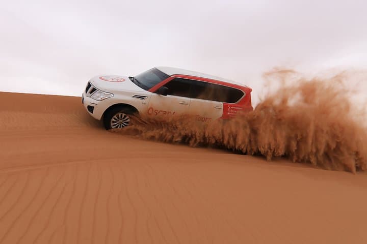 Lahbab Red Dune Safari: Evening Dune Bashing, Sandboarding, Camel Ride & VIP BBQ in Dubai photo 1