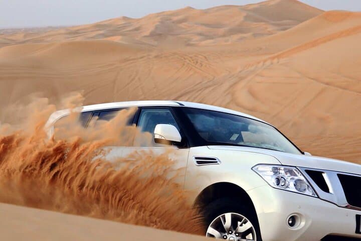 Dubai Desert Safari with Dinner, Live Show & Camel Ride — Evening Camp Experience