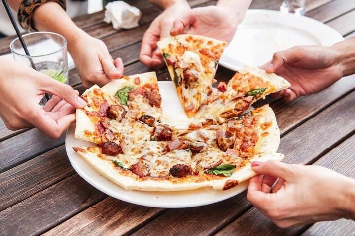 Manhattan Pizza Walking Tour: Neighborhood Slices with a Friendly Local Guide
