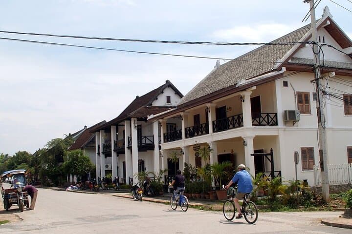 Half-Day Luang Prabang Bike Tour: Temples, Royal Palace & Riverside Ride