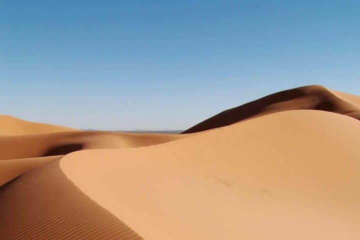 Evening Abu Dhabi Desert Safari: Dune Bashing, Camel Rides & BBQ Experience photo 3