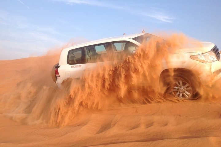Evening Abu Dhabi Desert Safari: Dune Bashing, Camel Rides & BBQ Experience