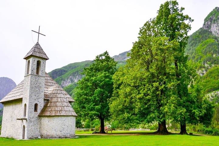 2-Day Theth Tour from Tirana — Hike Grunas Waterfall, Blue Eye & Alpine Villages photo 1