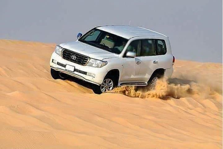 Sunset Desert Safari Dubai: Red Dunes, Belly Dance & BBQ Evening Experience photo 2