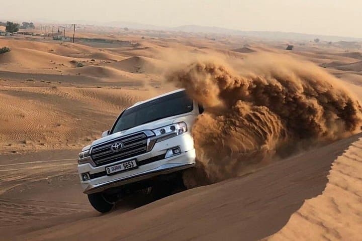 Morning Red Dune Safari with Camel Trekking and Sandboarding in Dubai photo 3