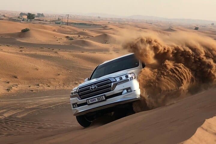 Dubai Red Dune Morning Safari: Private Camel Ride, Sandboarding & Dune Bashing photo 3