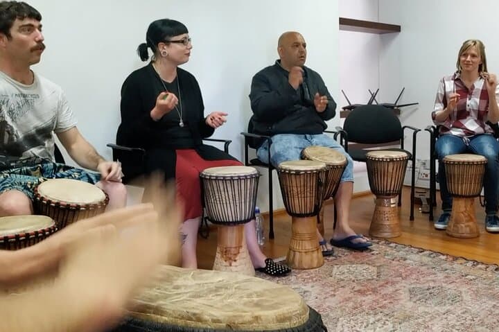 Cape Town Music Lesson with NGO Kids: Ukulele & Djembe Workshop photo 6