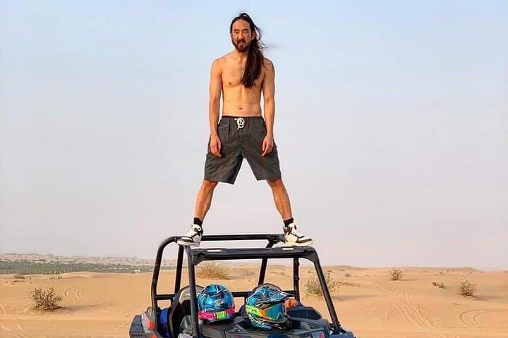 Dubai Evening Desert Safari: Sandboarding, Camel Rides and BBQ Under the Dunes photo 6