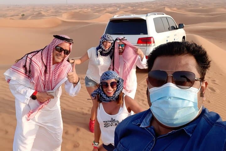 Dubai Red Dune Safari: Premium 4x4 Dune Bashing, Sandboarding & BBQ Dinner photo 4