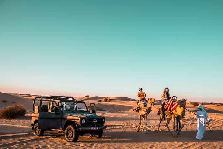 Morning Vintage G-Class Safari in Al Marmoom: Desert Ride, Bedouin Village & Camel Caravan