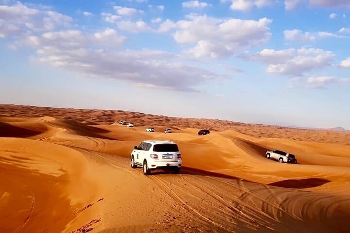Dubai Morning Red Dunes 4WD Safari & Camel Ride — Sunrise Dune Bashing & Sandboarding photo 1