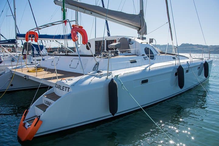 Sunset and City Sails: Private Catamaran Cruise on the Tejo aboard Scarlett photo 2