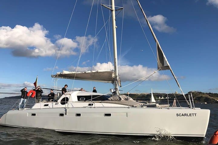 Sunset and City Sails: Private Catamaran Cruise on the Tejo aboard Scarlett photo 4