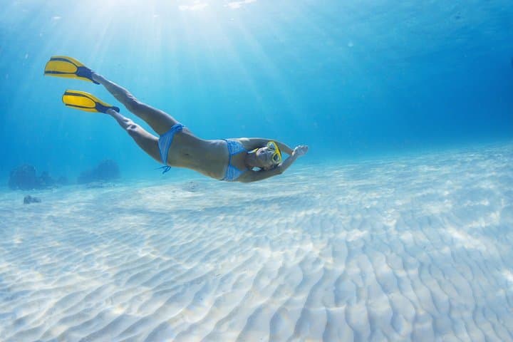 Midday Catamaran to Isla Mujeres: Snorkel, Beach Club & Downtown Stroll photo 2