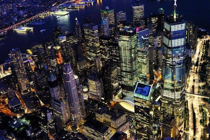 Soar Through the Glamorous New York Skyline at Night photo 2