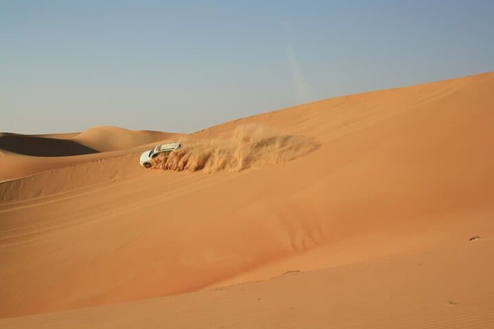 Dubai Red Dunes Morning Adventure: Dune Bashing, Sandboarding & Camel Rides photo 2