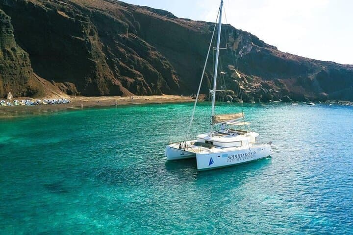 Santorini Private Catamaran Cruise: BBQ, Open Bar & Caldera Sail photo 6