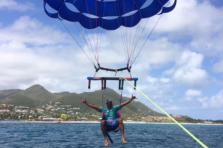 Soar Over Orient Bay: Parasailing 300 Feet Above Sint Maarten's Caribbean Beach photo 3