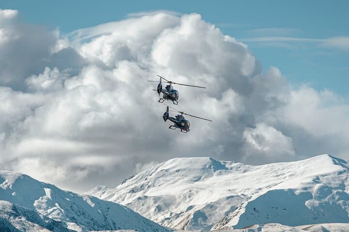 Helicopter Snow Landing from Queenstown: Alpine Scenic Flight & Snow Experience photo 3