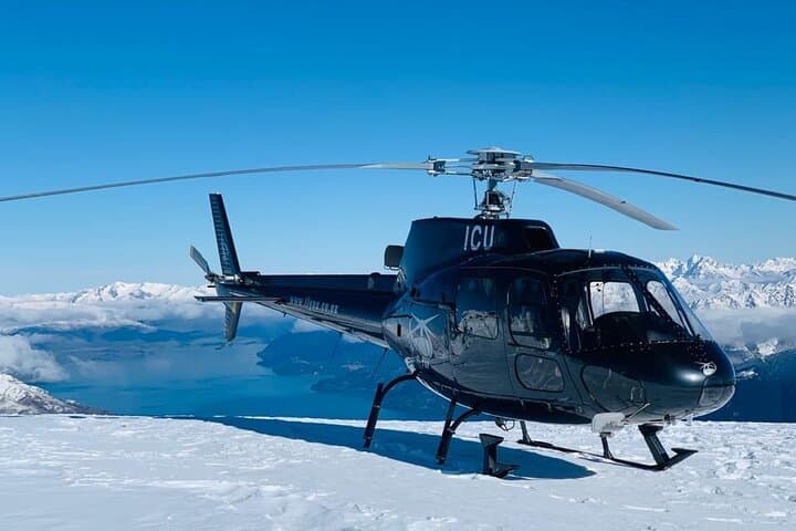 Helicopter Snow Landing from Queenstown: Alpine Scenic Flight & Snow Experience photo 4
