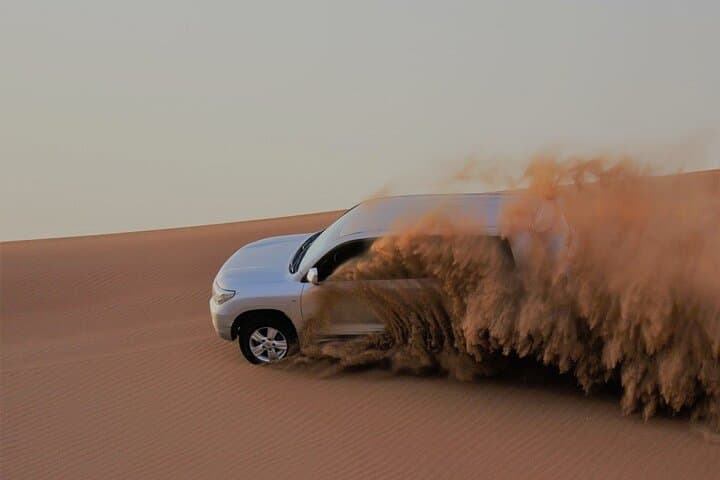 Morning Red Dunes Safari in Dubai — Camel Ride, Dune Bashing & Sandboarding photo 2