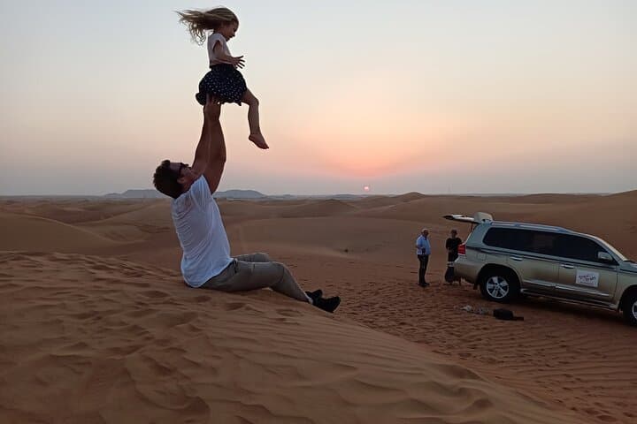 Morning Red Dunes Safari in Dubai — Camel Ride, Dune Bashing & Sandboarding photo 5