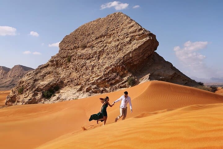 Fossil Rock Desert Safari: Private Dune-Bashing and Sandboarding Near Dubai photo 1