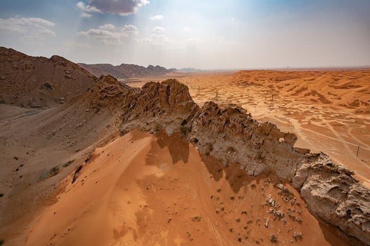 Fossil Rock Desert Safari: Private Dune-Bashing and Sandboarding Near Dubai photo 3