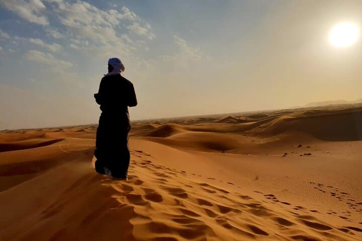 Evening Dubai Desert Safari: Dune Bashing, Camel Rides & Bedouin Camp Experience