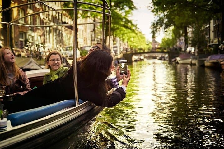 Private 2-Hour Amsterdam Canal Cruise with Live Guide & Drinks photo 3